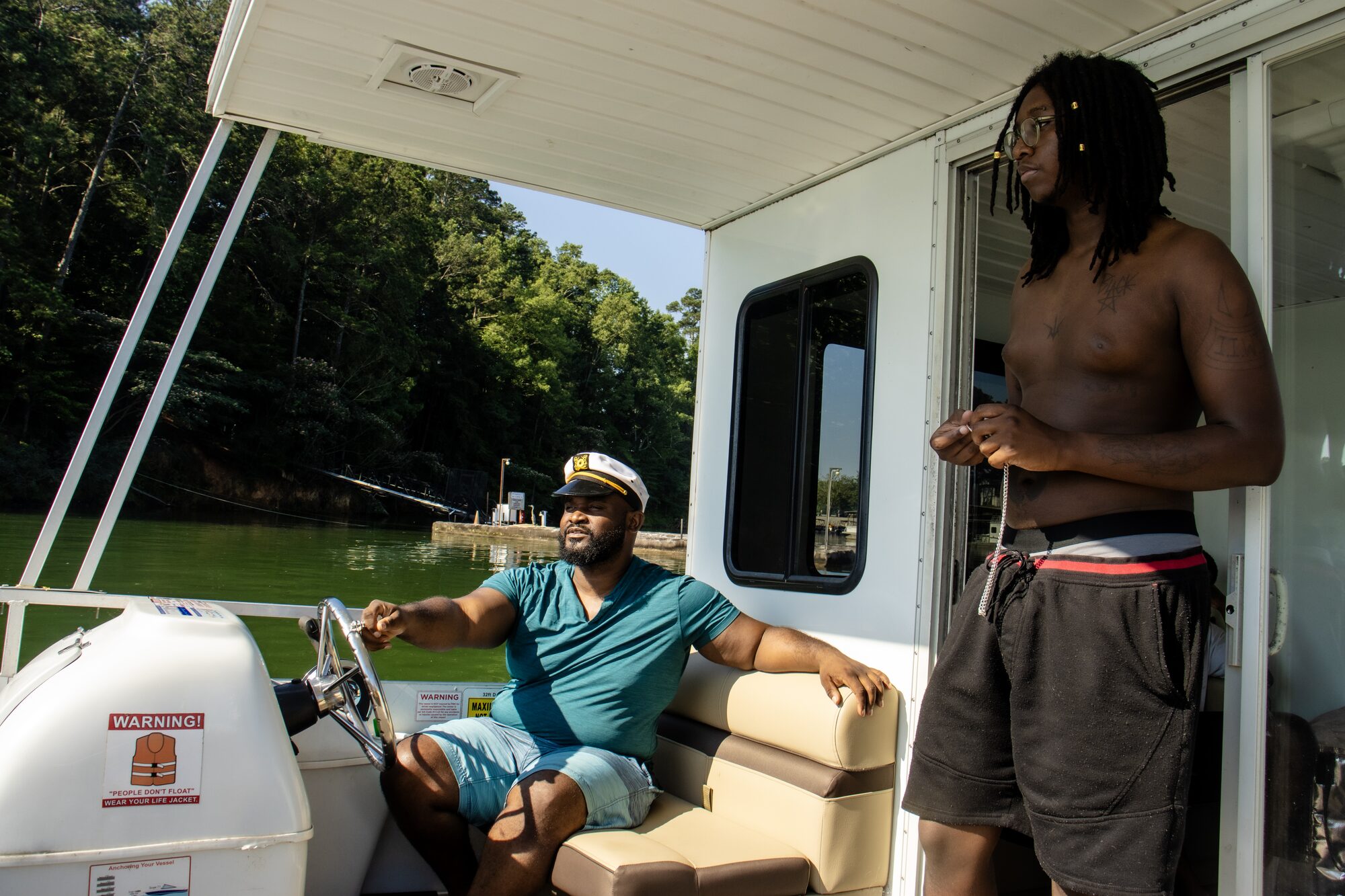 At the wheel as the boat pulls away from the dock onto Lake Allatoona